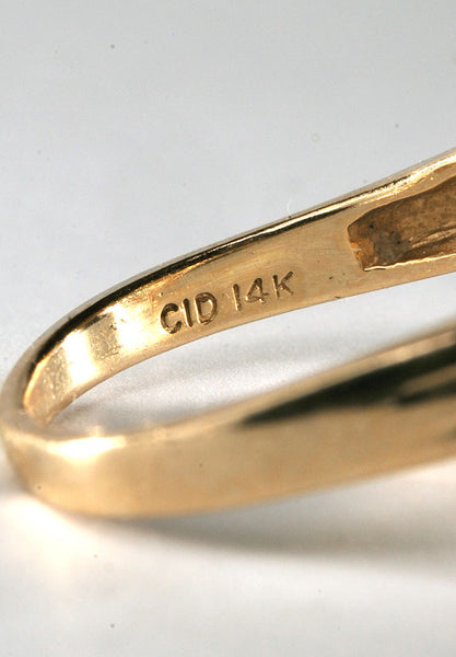 Emerald Ring in 14 Karat Yellow Gold